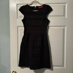 Cap sleeved black dress. Elle. Size 2